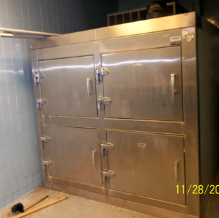 Illustration for article titled You Can Buy Your Very Own Used Morgue Fridge on Ebay Right Now